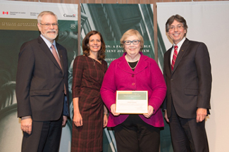 From left to right: Associate Deputy Minister Pierre Legault, Deputy Minister of Labour Lori Sterling (former Associate Deputy Minister of Justice), Andr&eacute;e Duchesne and Deputy Minister William F. Pentney.