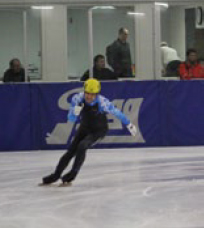 Photo d&rsquo;Alexandre Larouche pratiquant le patinage de vitesse